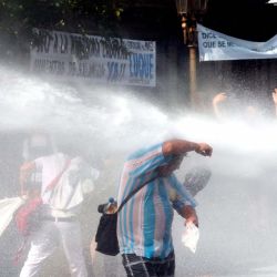 Movilización e incidentes a fuera del Congreso durante la sesión en Diputados por la Reforma Laboral, Buenos Aires. Argentina. Foto de Pablo Cuarterolo | Foto:AFP