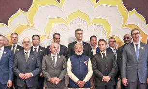 22_02_2026_narendra_modi_lula_da_silva_emmanuel_macron_afp_g