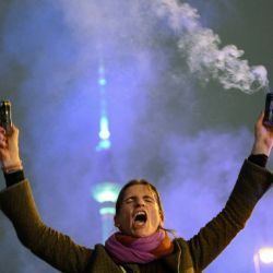 Concentración frente a la Torre de Televisión para conmemorar el cuarto aniversario de la invasión a gran escala de Rusia a Ucrania en Berlín. Foto de RALF HIRSCHBERGER / AFP | Foto:AFP