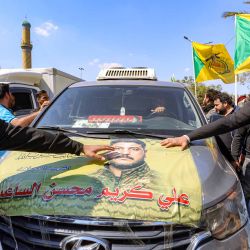 Procesión por los miembros asesinados del grupo paramilitar iraquí pro-Irán Brigadas Hezbollah que fueron muertos en un ataque aéreo estadounidense-israelí en su sede en al-Qaim. Foto de AHMAD AL-RUBAYE / AFP | Foto:AFP
