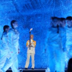 Imagen de la portadora de la antorcha, Bebe Vio, vista durante la ceremonia de inauguración de los Juegos Paralímpicos de Invierno Milán-Cortina 2026 en la Arena de Verona, en Verona, Italia. | Foto:Xinhua/Li Jing