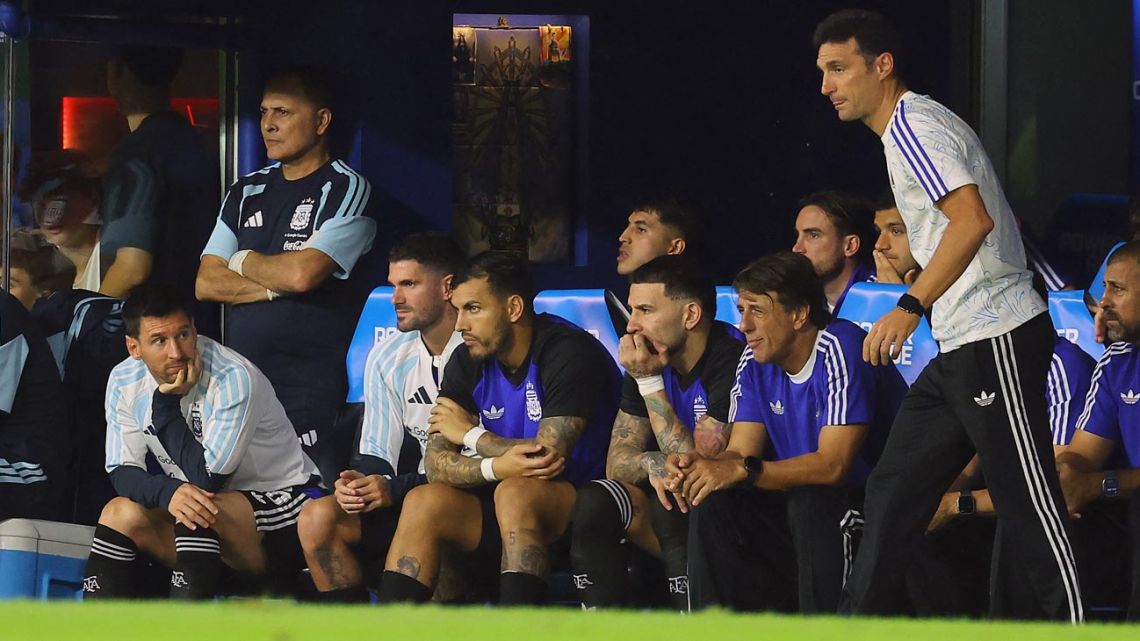 Lionel Messi, Rodrigo De Paul, Leandro Paredes, Nicoáas Otamendi and Lionel Scaloni look on during a friendly football match between Argentina and Mauritania at La Bombonera stadium in Buenos Aires on March 27, 2026.