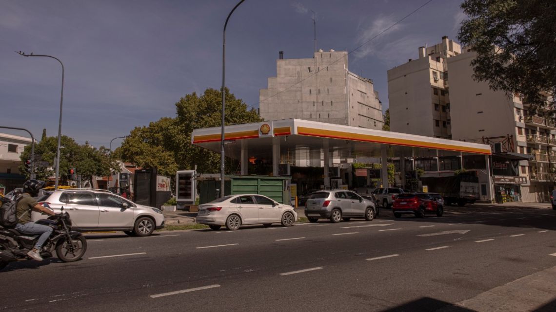Vehicles wait in line at a Shell gas station in Buenos Aires.