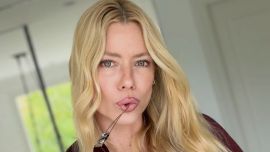 Nicole Neumann impone el look "anti otoño" con mini short y botas animal print