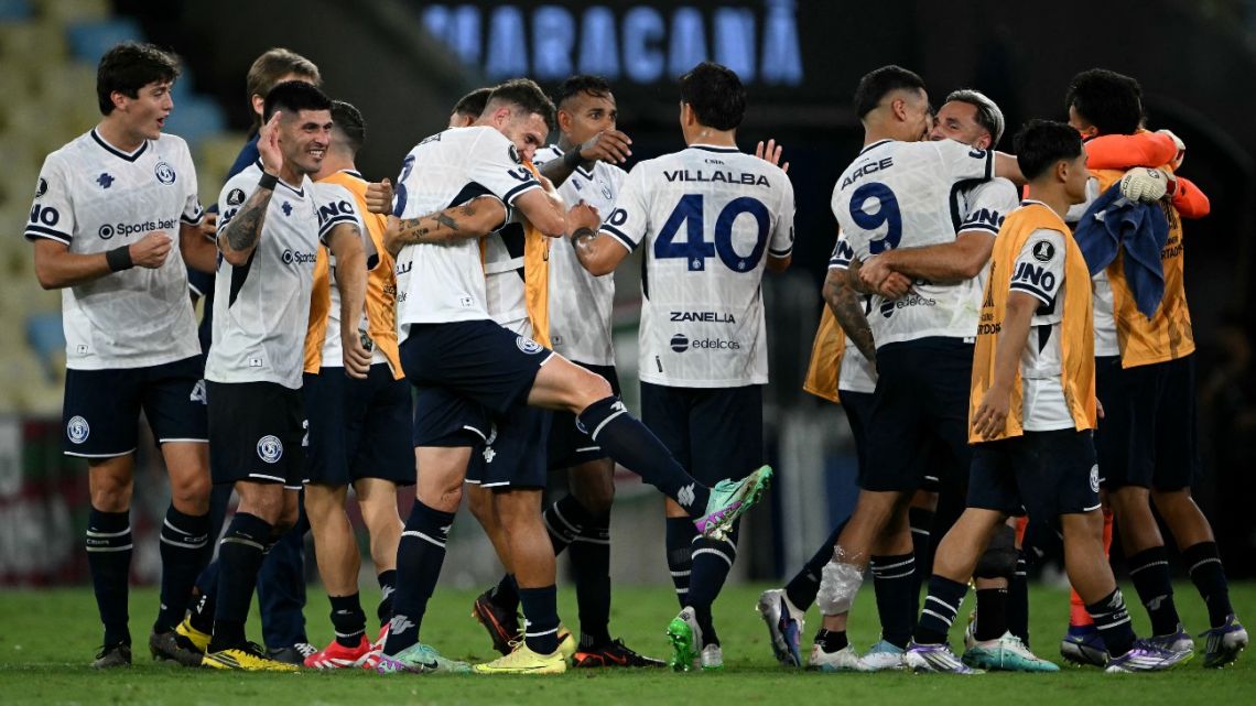 Independiente Rivadavia players celebrate after winning the Copa Libertadores group stage football match between Brazil's Fluminense and Argentina's Independiente Rivadavia at the Maracana stadium in Rio de Janeiro, Brazil, on April 15, 2026.