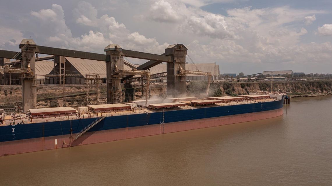 A ship is loaded at port in the Argentine agricultural hub of Rosario.