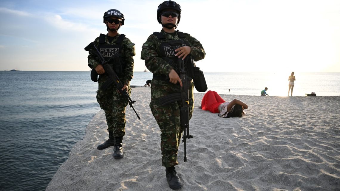 Colombian soldiers patrol the Pozos Colorados Beach ahead of the International Conference on the Just Transition Away from Fossil Fuels in Santa Marta, Colombia, on April 27, 2026.
