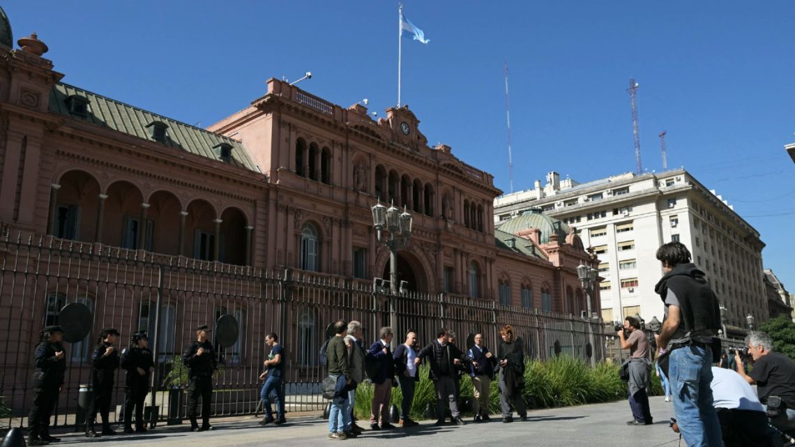Accredited journalists gather in front of Casa Rosada government palace after Argentina's President Javier Milei government banned access to accredited journalists in Buenos Aires on April 23, 2026.