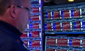 A trader works on the floor of the New York Stock Exchange. 