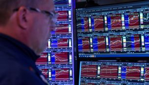 A trader works on the floor of the New York Stock Exchange. 