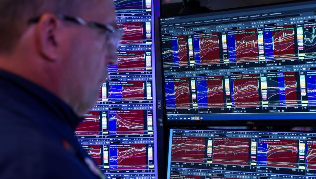 A trader works on the floor of the New York Stock Exchange. 