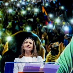La líder opositora venezolana exiliada y ganadora del Premio Nobel de la Paz, María Corina Machado, habla durante el Foro de la Libertad de Oslo en Oslo, Noruega. | Foto:Javad Parsa / NTB / AFP