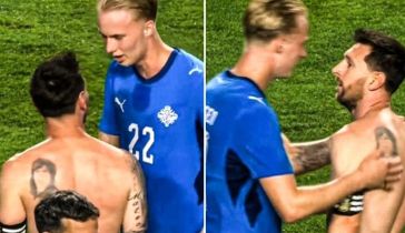Lionel Messi con Daníel Gudjohnsen 