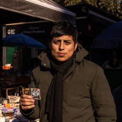 Panini FIFA World Cup stickers are exchanged in Parque Rivadavia. Collectors fill albums with stickers of players representing the 48 teams competing in the World Cup.