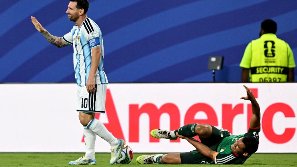 Algeria file complaint over referee's decision on Messi tackle