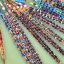 Fotogaleria Vista aérea tomada con un dron de equipos de botes del dragón reuniéndose para una carrera durante las celebraciones del Festival del Bote del Dragón, en China