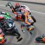 Fotogaleria El piloto argentino Valentín Perrone (C, volando por los aires) y el piloto español Marcos Uriarte (D, cayendo en la pista), del equipo Red Bull KTM Tech3, sufren un accidente durante la carrera de Moto3 en el circuito de Sachsenring
