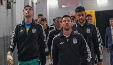 Emiliano "El Dibu" Martínez y Lionel Messi