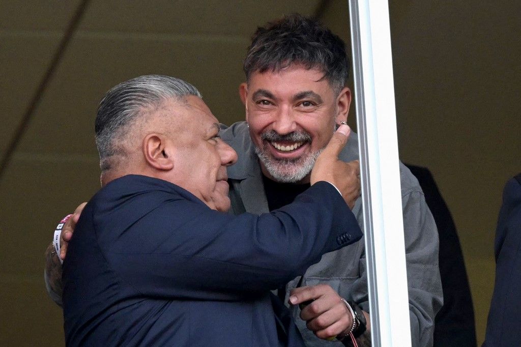 Chiqui Tapia y Pocho Lavezzi.