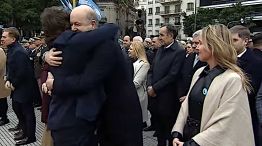 Milei abrazo con  Sturzenegger