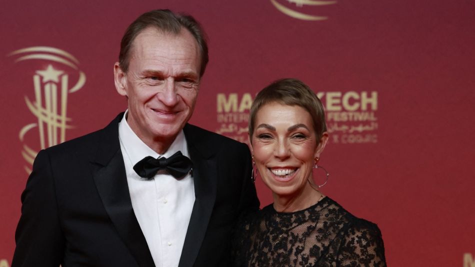 El productor de cine francés Nicolas Altmayer y la directora de relaciones públicas de Dior Couture, Mathilde Favier