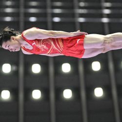El chino Yan Langyu compite en la final de gimnasia en trampolín masculino durante los Juegos Asiáticos de 2026, en el Gimnasio General de la Ciudad de Nagoya (Nagoya, prefectura de Aichi). | Foto:Mohd Rasfan / AFP