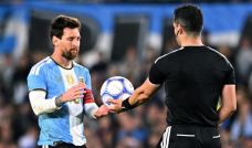 Lionel Messi y Fernando Vejar Díaz