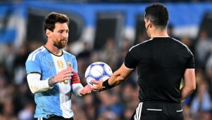 Lionel Messi y Fernando Vejar Díaz
