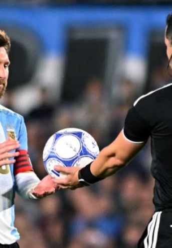 Lionel Messi y Fernando Vejar Díaz